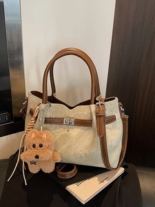 Retro light green textured fabric tote bag with brown leather handles and bear charm
