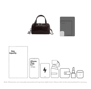 Deep brown leather boston bag detail showing internal storage capacity for daily essentials