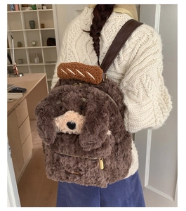 Detail of plush puppy backpack showing high-quality lamb wool texture and faux baguette decor