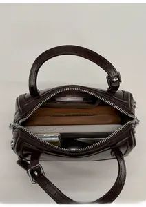 Overhead view showing the spacious interior of this dark brown leather Boston bag