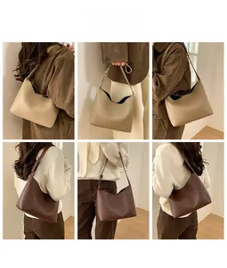 Detalle de bolsos hobo caqui y marrón que muestra la textura del cuero y ajuste