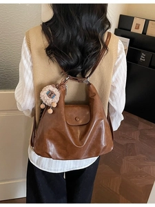 Vintage brown leather large capacity shoulder bag with cute bear charm for women