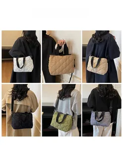 Quilted oversized tote bag shown in six colors worn by a model for daily commute style