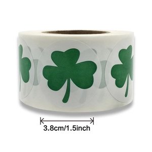 Detail view of 1.5-inch green shamrock stickers for St. Patrick's Day gift wrapping