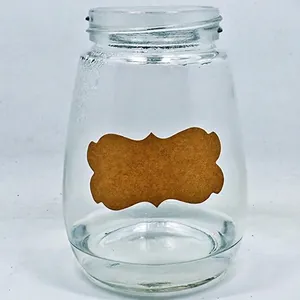 300 pieces of natural kraft paper Christmas gift labels on a glass storage bottle