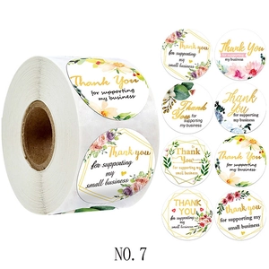 Detail view of 8 floral designs for Thank You roll stickers used in small business packaging