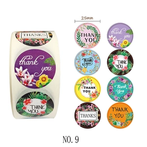 Detail view of 25mm diameter round floral thank you stickers in 8 assorted patterns