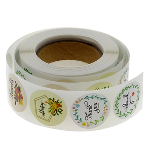 Roll of floral Thank You stickers for wedding gift packaging and envelope sealing