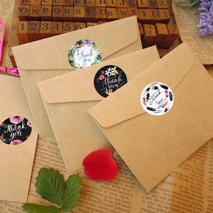 Set of 4 floral wreath Thank You stickers on kraft envelopes with a vintage aesthetic