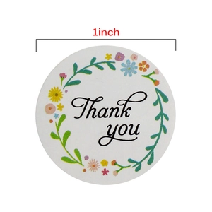 Roll of 1 inch floral Thank You stickers with colorful flower wreaths for wedding favors