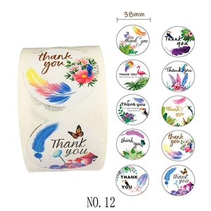 Macro detail of 38mm floral thank you stickers with nature motifs and wreath patterns