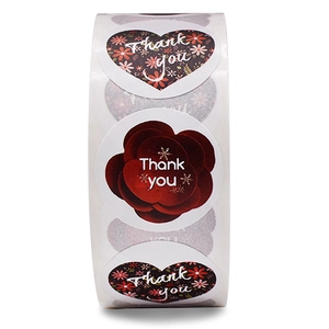 Floral Thank You stickers roll featuring heart and round floral adhesive label designs