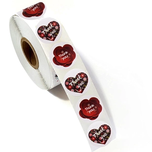 Floral Thank You stickers roll with red blossoms and heart patterns on white background