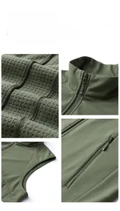 Detail view of army green outdoor vest featuring grid texture and precision zipper closure