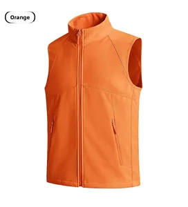 Detail shot of an orange outdoor vest with stand collar, zipper pockets and breathable mesh fabric
