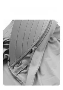 Detail of the sun protection jacket featuring a detachable brim with a zipper design