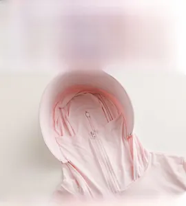 Detailed hood and integrated face mask of a pink UV protection cooling summer jacket