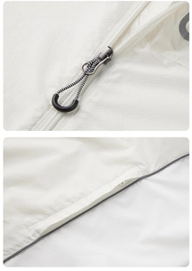 Detail der weißen UV-Schutzjacke aus Eisseide mit Ripstop-Gewebe und Reflexstreifen