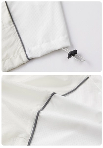 Makro-Detail aus atmungsaktivem Ripstop-Gewebe mit verstellbarem Saumzug und Paspel