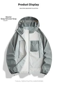 Détail de la veste solaire à capuche avec poche zippée et poignets élastiqués