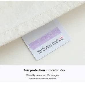 UV sensor card on white sun protection jacket showing ultraviolet intensity level