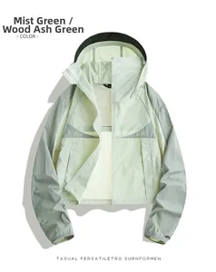 Detail of hooded UV protection jacket in misty green and ash grey outdoor windbreaker