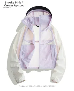Close-up of the breathable UPF50+ hooded sun jacket in smoky pink and beige colors