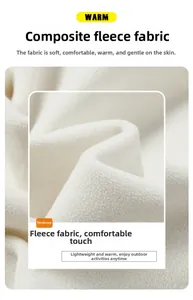 Makroaufnahme von weißem, dickem Fleece für eine warme 3-in-1 wasserdichte Winterjacke