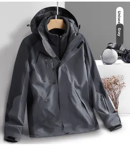 Detail of gray waterproof 3-in-1 outdoor jacket with detachable fleece liner and hood