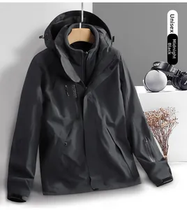 Detail of 3-in-1 waterproof jacket in midnight black with fleece lining and outdoor logo