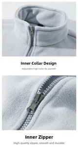 Detail of light gray fleece inner lining with standing collar and smooth zipper closure