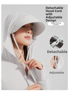Detail of adjustable drawstring and detachable hood on light gray sun protection jacket