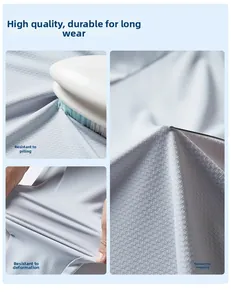 Close-up of light blue mesh fabric showing anti-pilling and snag-resistant durability