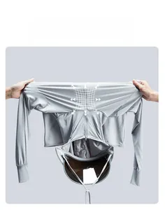 Detail of high-elasticity breathable gray sun protection fabric being stretched