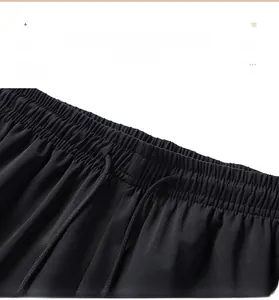 Detail of elastic waistband and adjustable drawstring on men's quick-dry sports shorts
