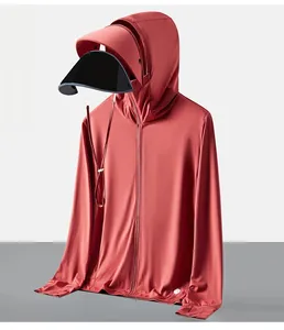 Detail of brick red sun protection jacket with detachable black brim and mesh fabric