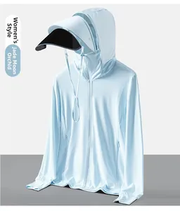 Detail of light blue sun protection jacket with breathable mesh fabric and large brim hood