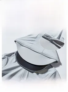 Detail of light gray sun protection jacket featuring a detachable black brim and zipper