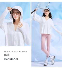 Detail of white sun protection jacket with wide brim hood and thumbhole sleeves