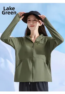 Detail of lake tea green sun protection jacket with UPF 50+ logo and side pocket