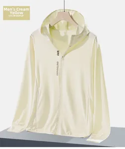 Detail of cream yellow sun protection jacket showing UPF50+ logo and breathable fabric