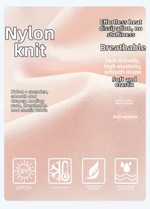 Detailed macro view of light pink ice silk fabric with UPF50+ sun protection texture
