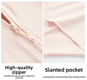Detail view of smooth zipper and side pocket on pink sun protection jacket