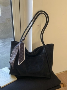 Minimalist black large capacity tote bag in matte suede finish with decorative silk scarf
