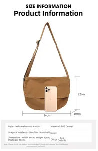 Size guide for large brown canvas messenger bag showing 34cm width and 22cm height dimensions