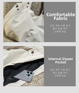 Detailed view of beige nylon tote bag featuring inner zipper pocket and metal grommets
