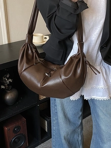 Retro dark brown large crescent crossbody bag with knotted strap and pleated design