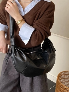 Retro black oversized crescent hobo bag with pebble leather texture and knotted strap
