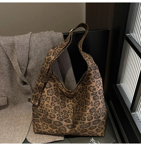Macro shot of the retro leopard print faux suede fabric texture and soft drape detail