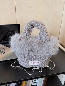 Grey faux fur crossbody bag with lamb wool texture and silver metal bead chain